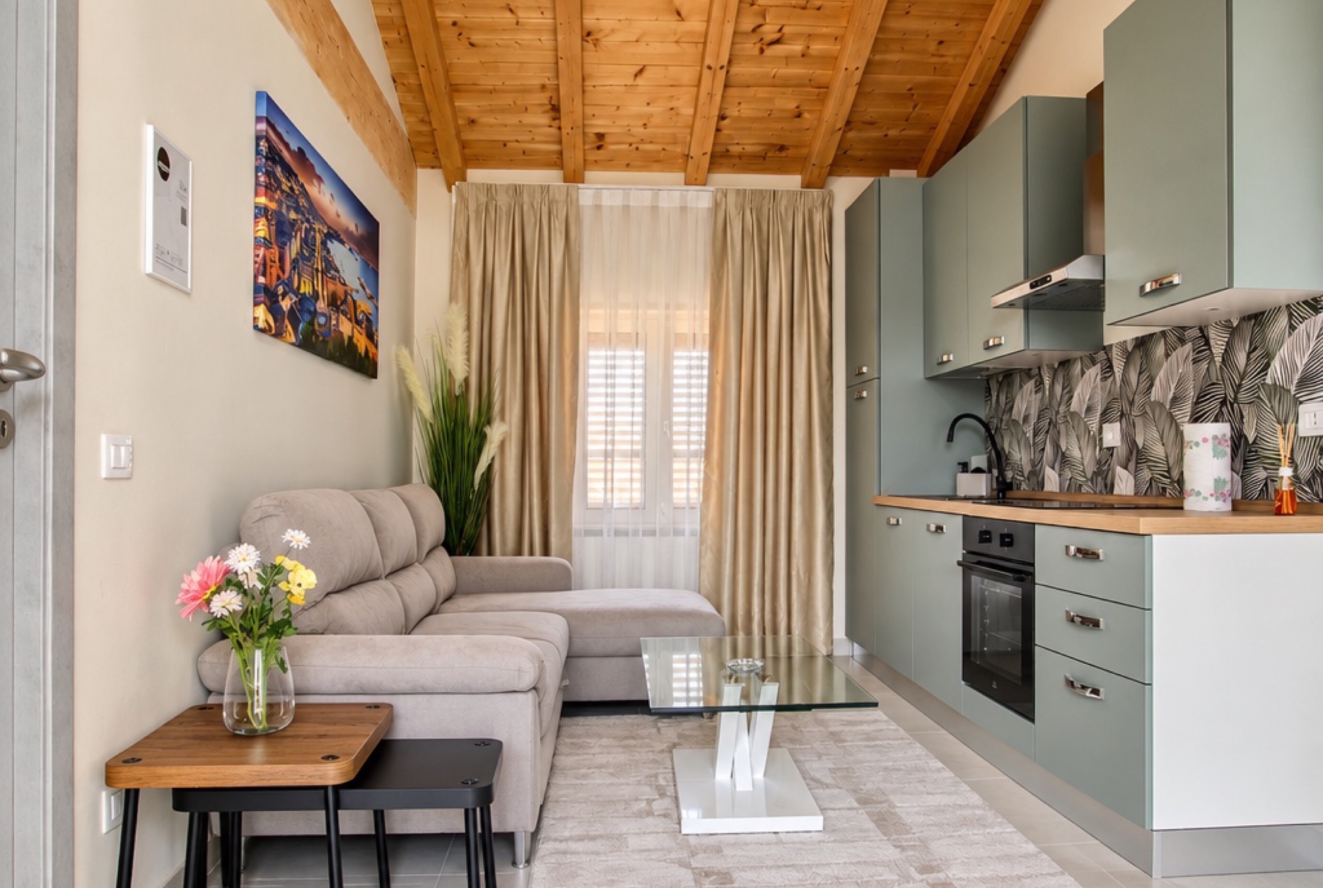 The living room of an Il Tramonto apartment, bright and carefully furnished